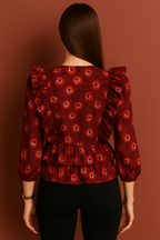 Emerald Green Floral Printed Crepe Peplum Top with Ruffled Shoulders and Three Quarter Sleeves