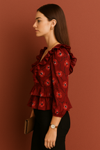 Emerald Green Floral Printed Crepe Peplum Top with Ruffled Shoulders and Three Quarter Sleeves