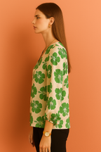 V-Neck Cream Top with Bold Hibiscus Floral Print and Long Sleeves